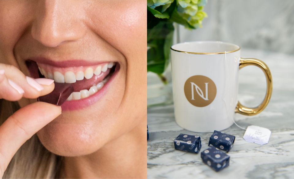 A woman biting into Sleep+ Energy+ Wellness Chews with a cup of tea next to her.